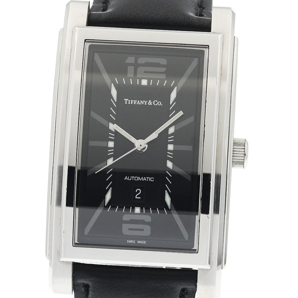 Tiffany Co Grand automatic date men's stainless steel watch: Tiffany Co Grand automatic date men's stainless steel watch This Tiffany & Co. Grand Date men's wristwatch features a stainless steel case paired with a black dial and an automatic movement. The watch
