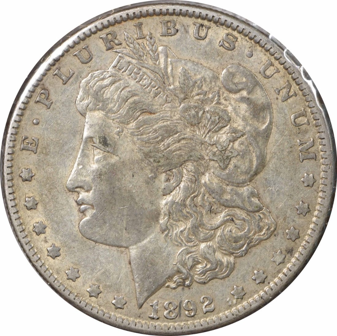 1892-O Morgan Silver Dollar VAM 5 Doubled Ear Uncertified Coin: 1892-O Morgan Silver Dollar VAM 5 Doubled Ear Uncertified Coin This 1892-O VAM 5 (7) Morgan Silver Dollar features a stunning design by George T. Morgan. With a composition of 90% silver and 10% coppe