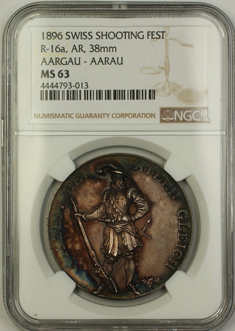 Swiss 1896 Aargau-Aarau Silver Shooting Medal NGC MS 63 R-16a: Swiss 1896 Aargau-Aarau Silver Shooting Medal NGC MS 63 R-16a This is an 1896 Aargau-Aarau Switzerland Silver Swiss Shooting Fest Medal, catalogued as R-16a. The medal is composed of silver and has be