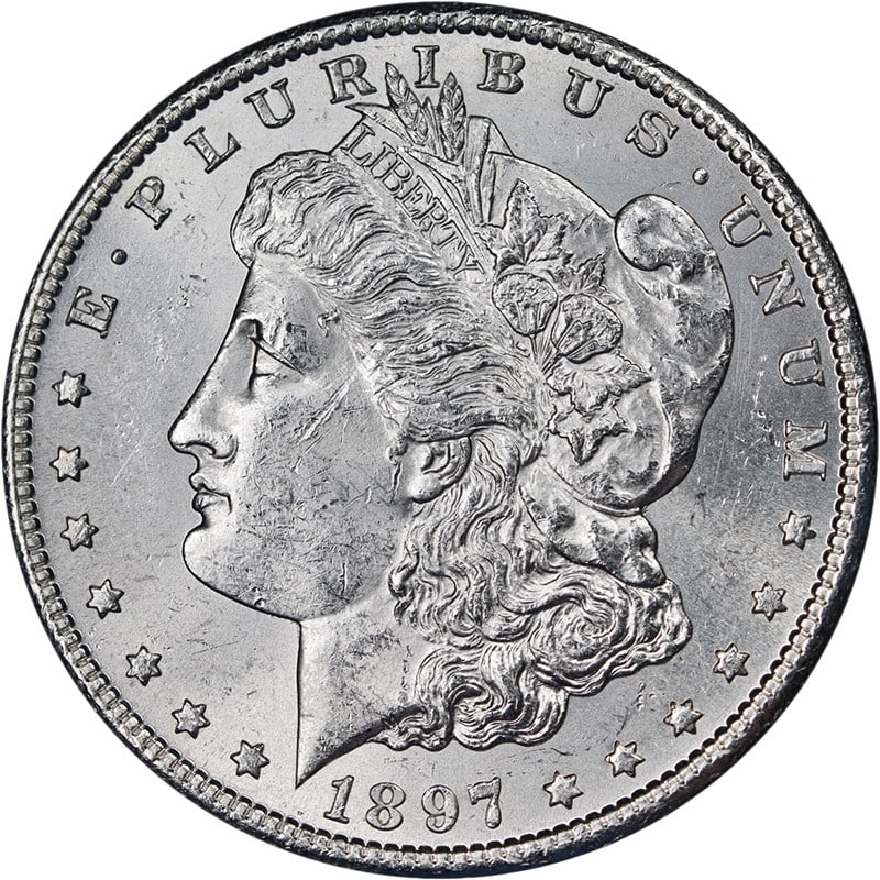 1897-S Morgan Dollar BU+ Blast White Uncertified Silver: 1897-S Morgan Dollar BU+ Blast White Uncertified Silver This 1897-S Morgan Silver Dollar is an uncirculated coin featuring a brilliant blast white appearance, exceptional luster, and a strong strike. 
