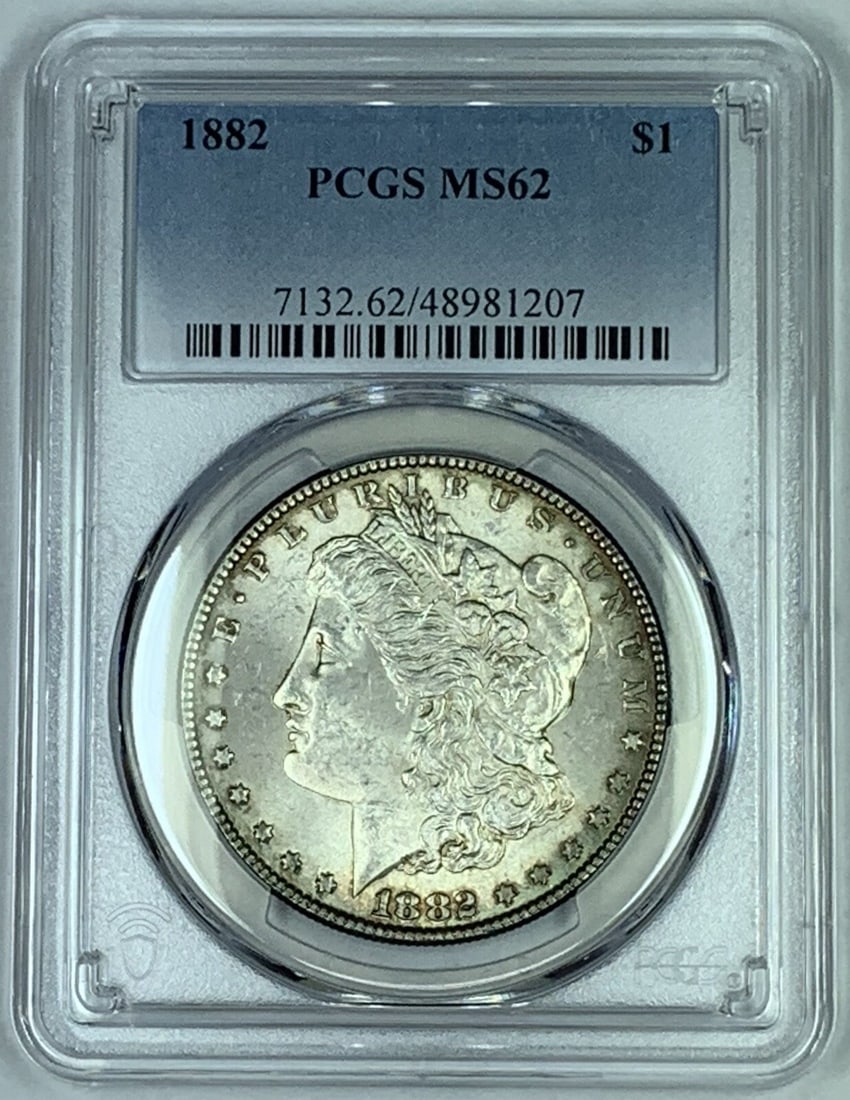 PCGS MS62 1882 Morgan Silver Dollar Toned Uncirculated US Coin: PCGS MS62 1882 Morgan Silver Dollar Toned Uncirculated US Coin This is an 1882 Morgan Silver $1 Dollar Coin featuring attractive toning. Certified by PCGS as MS 62, this uncirculated coin is composed 