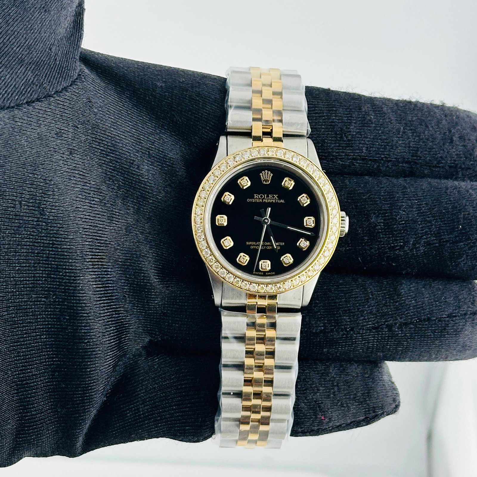 Ladies Rolex Datejust 6430 Black Dial Yellow Diamond Markers Jubilee Bracelet: Ladies Rolex Datejust 6430 Black Dial Yellow Diamond Markers Jubilee Bracelet This ladies' Rolex Datejust features an aftermarket black dial with yellow diamond markers and an aftermarket Jubilee brac