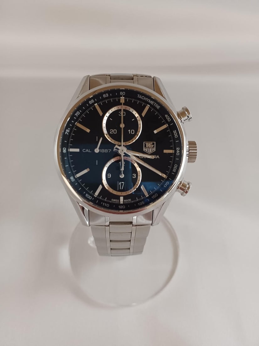 TAG Heuer CAR2110.BA0724 Carrera Caliber 1881 Mens Chronograph Watch: TAG Heuer CAR2110.BA0724 Carrera Caliber 1881 Mens Chronograph Watch TAG Heuer Carrera Caliber 1881 chronograph men's wristwatch. The watch is pre-owned and of Swiss origin. Specifications Brand: TAG 