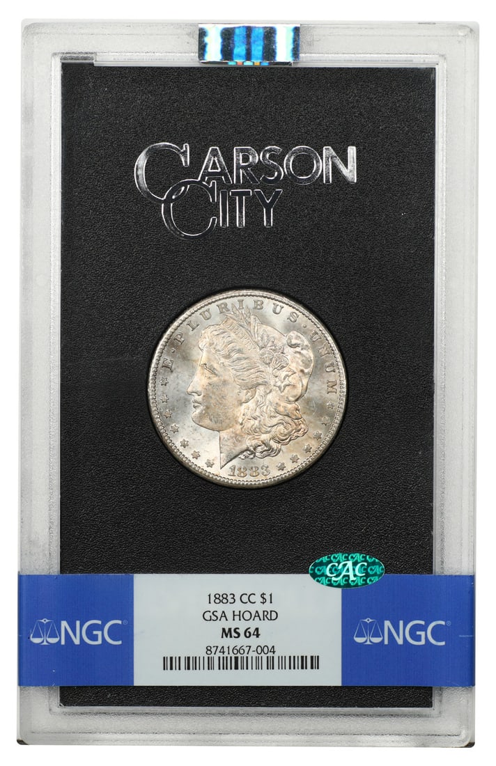 1883 Carson City Morgan Dollar $1 NGC MS64 CAC GSA Holder: 1883 Carson City Morgan Dollar $1 NGC MS64 CAC GSA Holder 1883-CC Morgan Dollar $1 certified by NGC and CAC, presented as a GSA issue housed in the original hard case. This pre-owned example is an eve