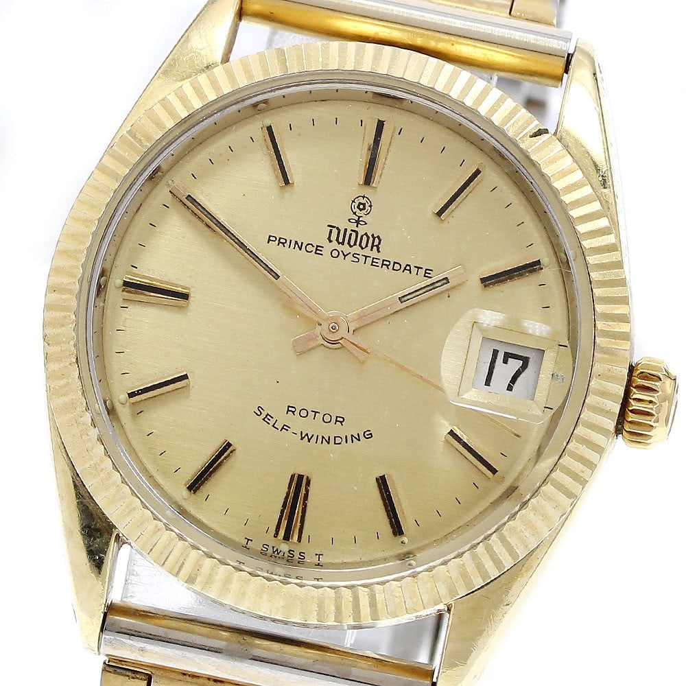 TUDOR Prince Oysterdate 7990 5 Automatic Mens Wristwatch YG Bezel: TUDOR Prince Oysterdate 7990 5 Automatic Mens Wristwatch YG Bezel TUDOR Prince Oysterdate men's automatic wristwatch with a yellow gold bezel. The watch is pre-owned and made in Switzerland. Specifica