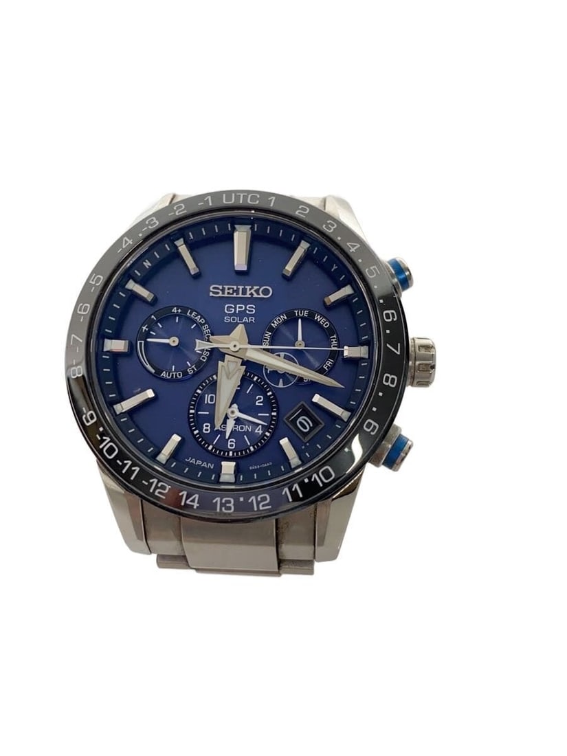 Seiko Astron navy stainless steel wristwatch: Seiko Astron navy stainless steel wristwatch This SEIKO Astron 5X53-0AE0 men's wristwatch features a navy dial and a stainless steel case and band. Designed in Japan, the watch is pre-owned and graded