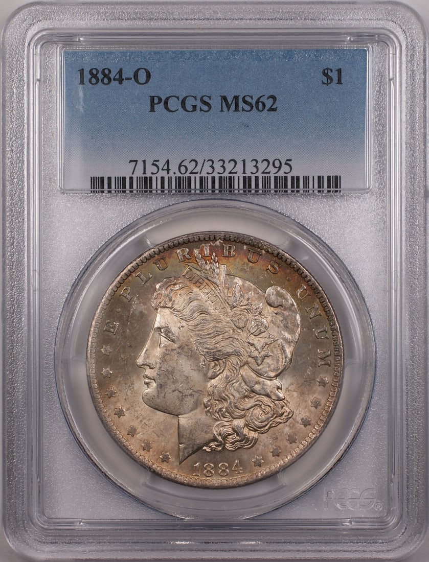 PCGS MS 62 1884-O New Orleans Morgan Dollar with Rainbow Toning: PCGS MS 62 1884-O New Orleans Morgan Dollar with Rainbow Toning This 1884-O Morgan Silver Dollar features beautiful rainbow toning and is certified by PCGS with a grade of MS 62. Minted in New Orleans