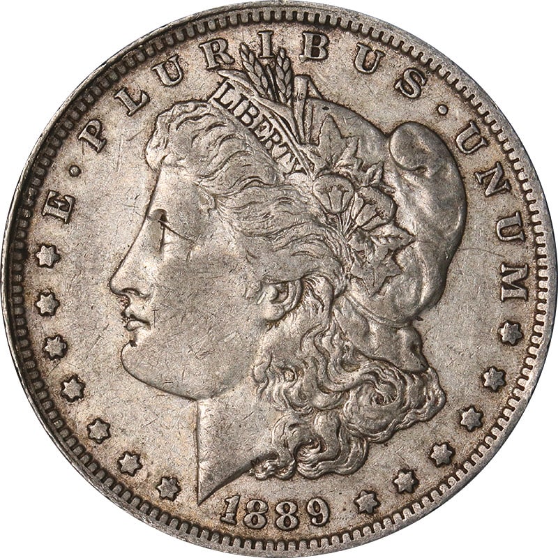 1889-O New Orleans Morgan Dollar E Reverse Silver: 1889-O New Orleans Morgan Dollar E Reverse Silver This is an 1889-O Morgan Silver Dollar featuring the distinctive 'E' on the reverse. Minted in New Orleans, this circulated coin is composed of 90% si