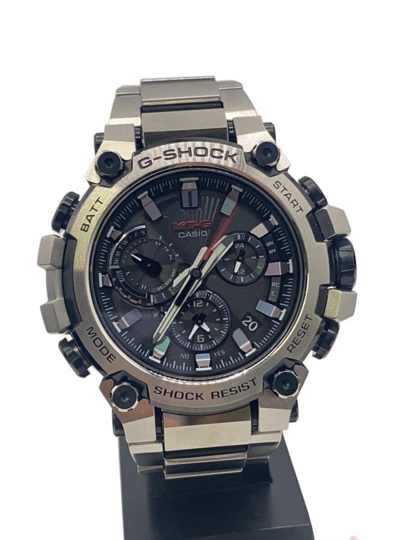 Casio G Shock MTG B3000D 1AJF Black Wristwatch: Casio G Shock MTG B3000D 1AJF Black Wristwatch This CASIO G-SHOCK MTG-B3000D-1AJF is a men's wristwatch from Japan, featuring a robust design in black. The watch is pre-owned and shows slight signs of