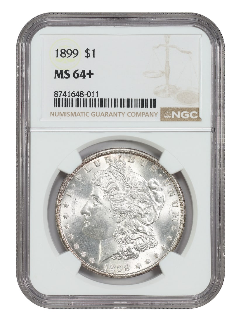 1899 Philadelphia Morgan Dollar $1 NGC MS64+: 1899 Philadelphia Morgan Dollar $1 NGC MS64+ 1899 Morgan Dollar $1 certified by NGC and graded MS64+. This Philadelphia-minted coin is an uncirculated example from the Morgan Dollar series. It is desc
