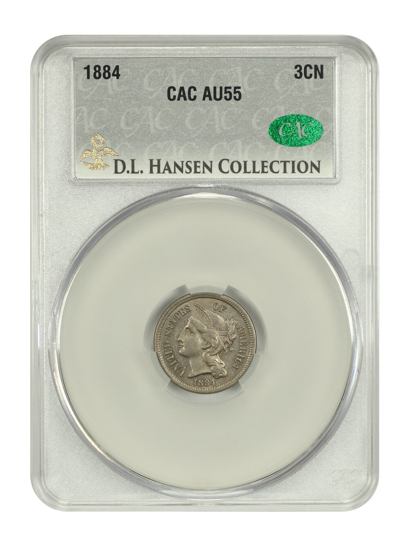CACG AU55 1884 3CN Three Cent Nickel ex D.L. Hansen: CACG AU55 1884 3CN Three Cent Nickel ex D.L. Hansen 1884 Three Cent Nickel certified by CACG and graded AU55. Minted in Philadelphia, this circulated example has original gunmetal grey surfaces with g