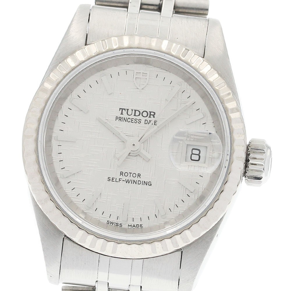 Women's Automatic Wristwatch TUDOR Princess Date 92414 WG Bezel: Women's Automatic Wristwatch TUDOR Princess Date 92414 WG Bezel TUDOR Princess Date women's wristwatch with automatic movement and a WG bezel. This pre-owned Swiss-made watch is identified as model 92