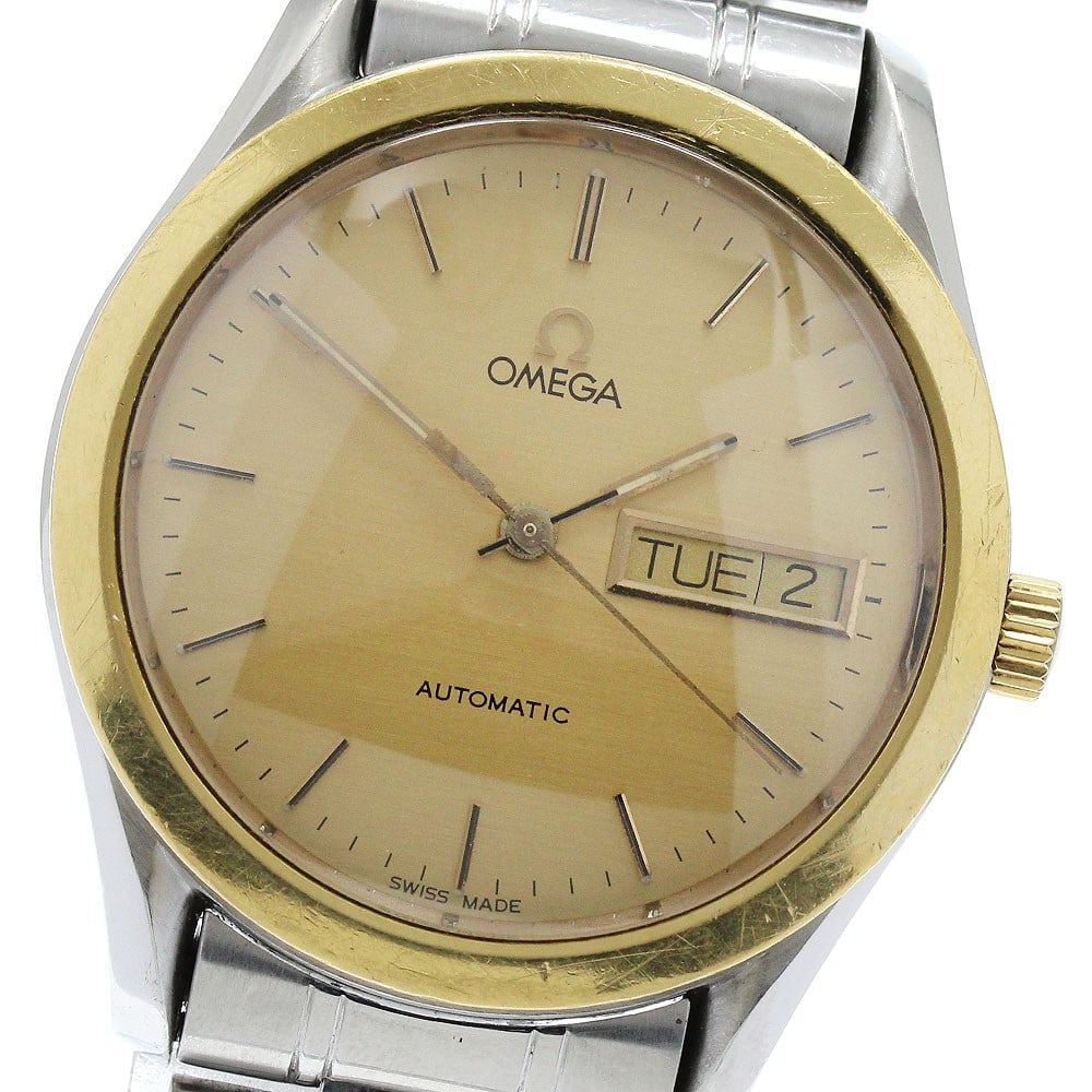 OMEGA Classic Automatic Day-Date Men's Watch 166.0299 5120.10 YG Bezel: OMEGA Classic Automatic Day-Date Men's Watch 166.0299 5120.10 YG Bezel This OMEGA Classic men's wristwatch features a yellow gold bezel and stainless steel case, paired with a gold-tone dial and stain