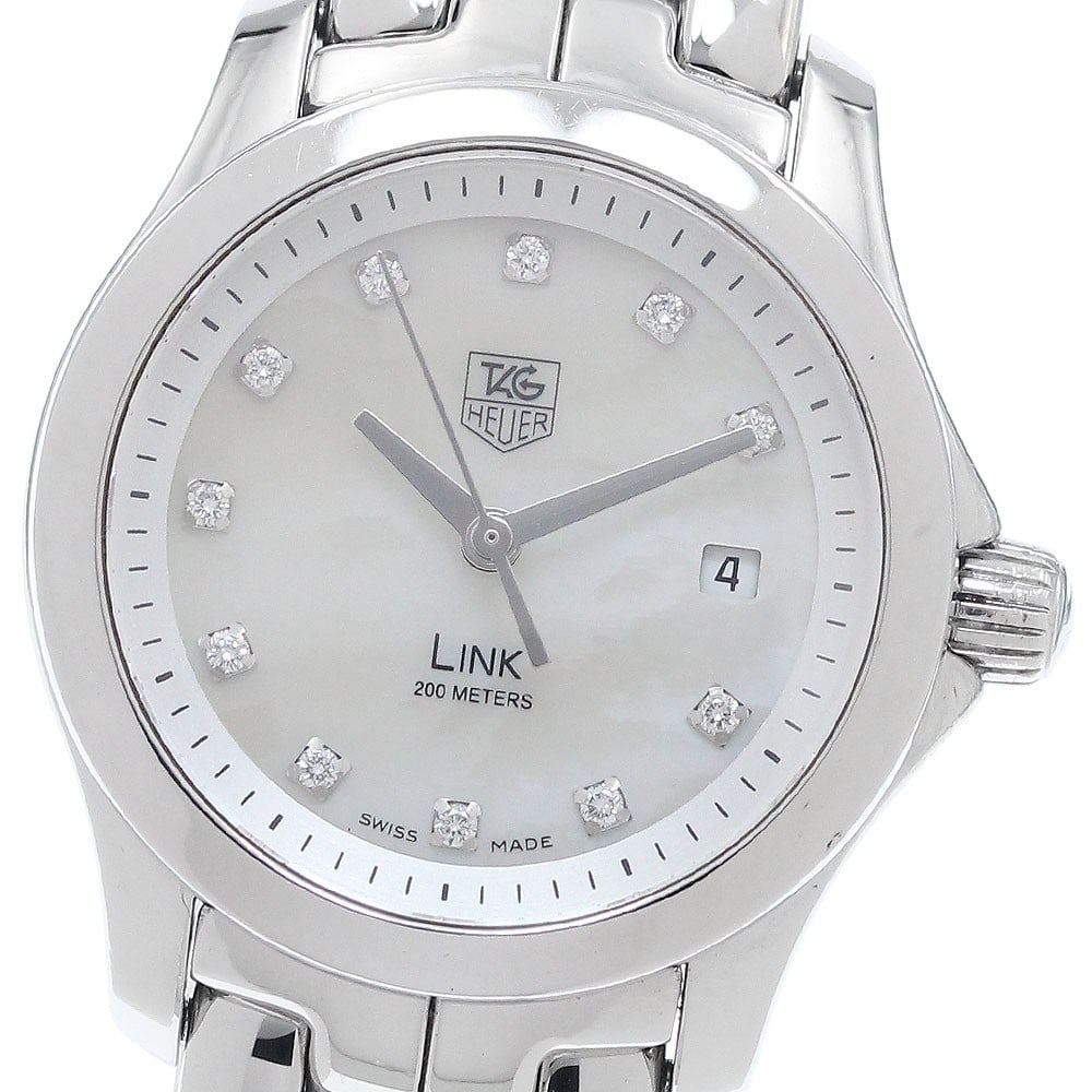TAG Heuer Link Quartz Date Womens Stainless Steel Watch WJF1317: TAG Heuer Link Quartz Date Womens Stainless Steel Watch WJF1317 This TAG Heuer Link women's wristwatch features a stainless steel case and bracelet, complemented by a white mother-of-pearl dial set wi