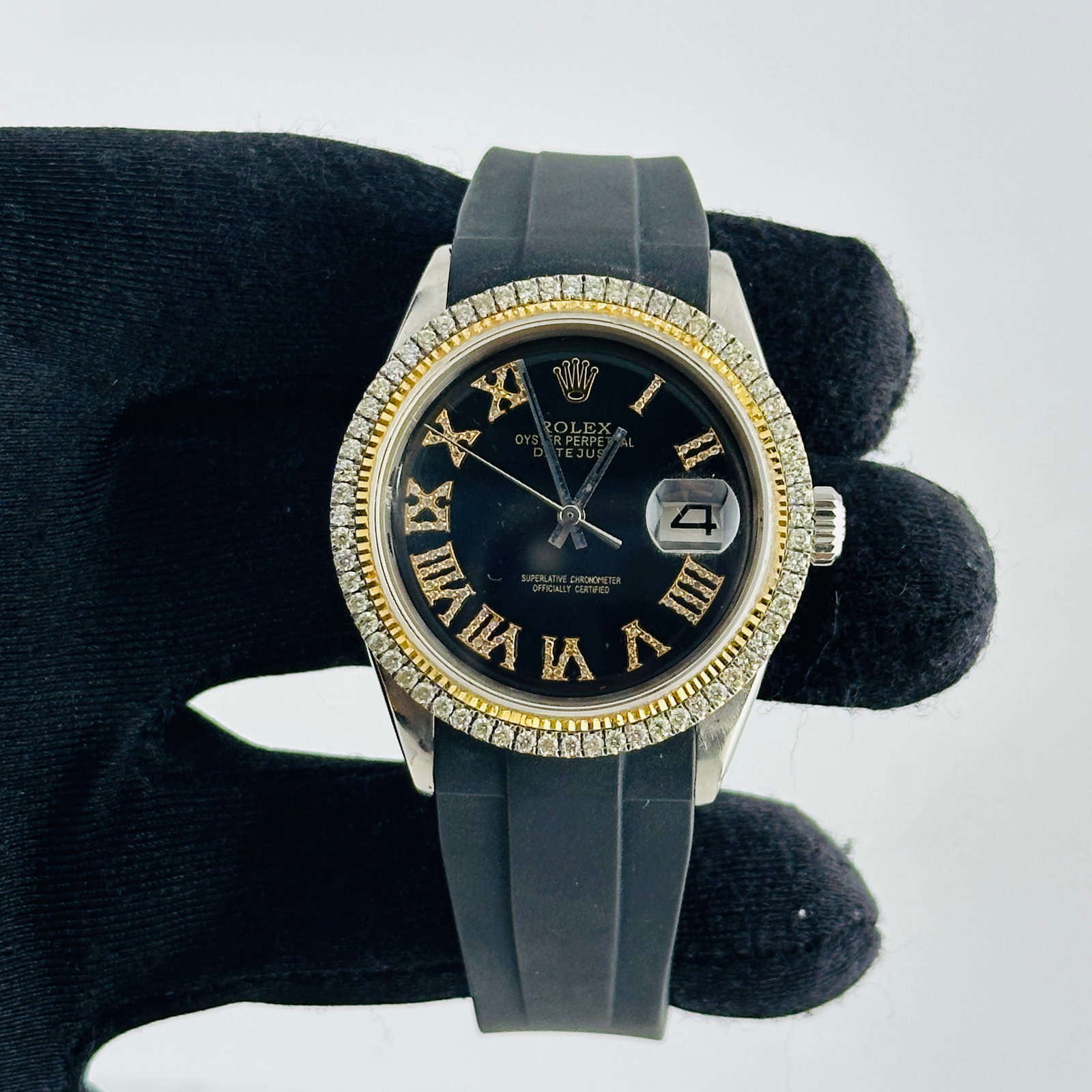 Rolex Datejust 1601 Mens Watch Black Roman Dial Diamond Bezel Rubber Band: Rolex Datejust 1601 Mens Watch Black Roman Dial Diamond Bezel Rubber Band This men's Rolex Datejust features an aftermarket black dial adorned with Roman numerals and diamond accents. The watch is equ