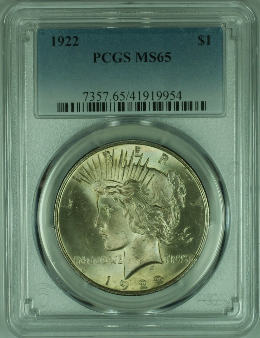 PCGS MS-65 1922 Peace Silver Dollar with Attractive Light Toning: PCGS MS-65 1922 Peace Silver Dollar with Attractive Light Toning This 1922 Peace Silver Dollar is graded MS-65 by PCGS and features beautiful light toning. Minted in Philadelphia, the uncirculated coi