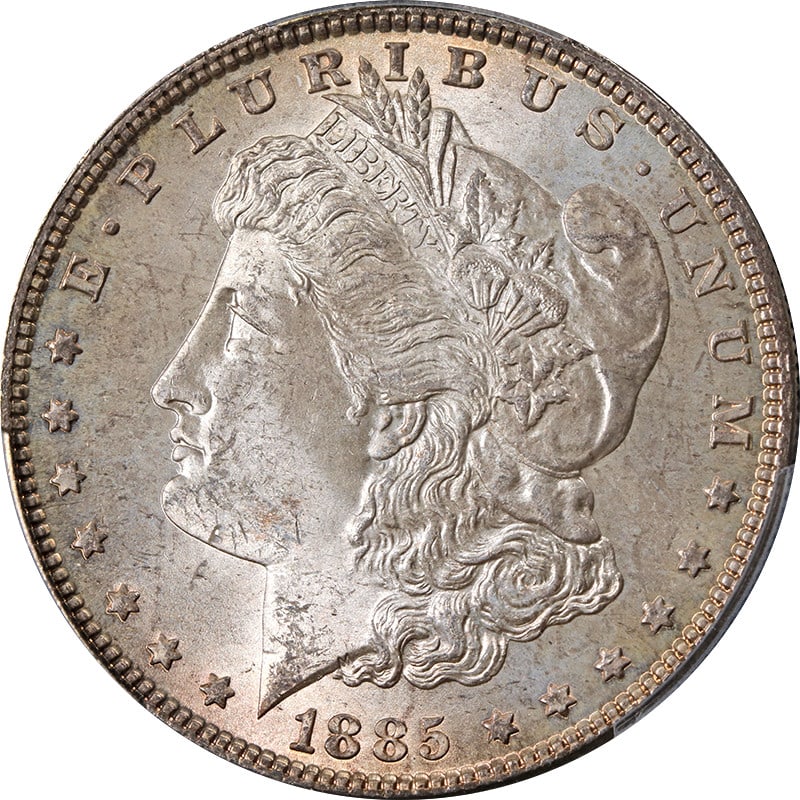 PCGS MS64 1885 Morgan Dollar Philadelphia Silver with Toning: PCGS MS64 1885 Morgan Dollar Philadelphia Silver with Toning This 1885-P Morgan Silver Dollar is graded MS64 by PCGS and features attractive toning. Struck at the Philadelphia mint, this uncirculated 