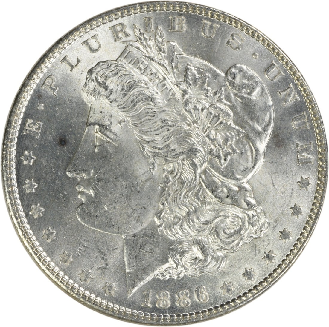 Choice BU 1886 Silver Dollar Morgan Uncirculated No Mint Mark: Choice BU 1886 Silver Dollar Morgan Uncirculated No Mint Mark This is an 1886 Morgan Silver Dollar from the United States, featuring a Choice Brilliant Uncirculated (BU) grade. The coin is composed of