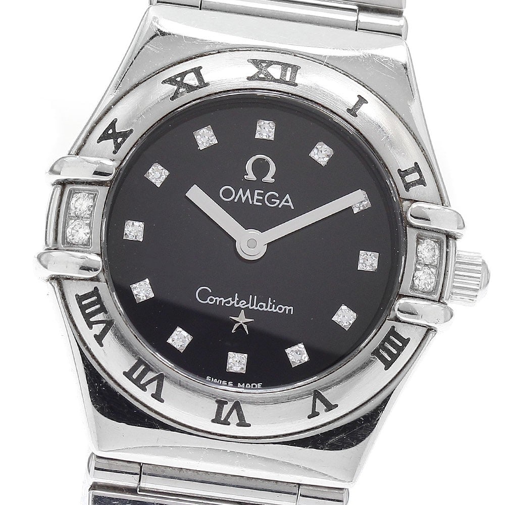 Omega Constellation 1566.56 Women's Quartz Wristwatch: Omega Constellation 1566.56 Women's Quartz Wristwatch This OMEGA Constellation Quartz ladies wristwatch features a stainless steel case and bracelet with a black dial. The watch is powered by a quartz