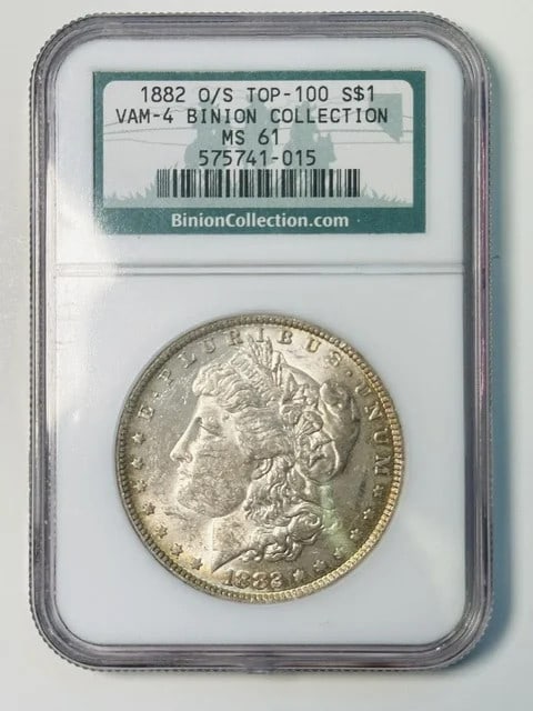 1882 O S Morgan Dollar NGC MS 61 Binion Collection: 1882 O S Morgan Dollar NGC MS 61 Binion Collection This 1882 O/S Morgan Silver Dollar is graded MS 61 by NGC and originates from the Binion Collection. Struck in the USA, this pre-owned coin is compos