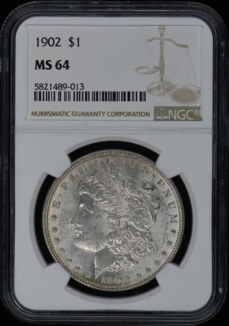 1902 Morgan Dollar S$1 NGC MS64 Uncirculated Philadelphia Mint: 1902 Morgan Dollar S$1 NGC MS64 Uncirculated Philadelphia Mint This 1902 Morgan Dollar is a stunning example of United States coinage, graded MS64 by NGC, indicating its uncirculated condition with mi