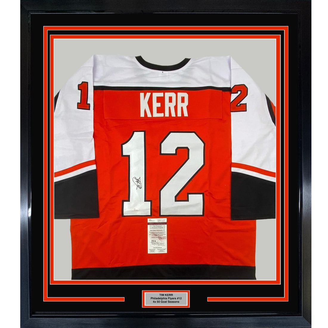Framed Tim Kerr Autographed Philadelphia Flyers Jersey with JSA COA: Framed Tim Kerr Autographed Philadelphia Flyers Jersey with JSA COA This professionally framed and matted jersey features the autographed signature of NHL legend Tim Kerr, showcasing his affiliation w