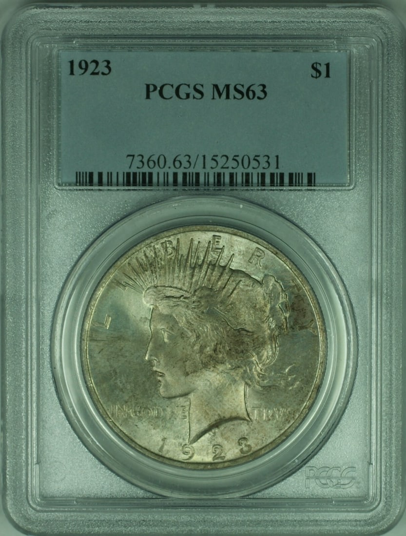 1923 Peace Dollar Silver Coin PCGS MS63 Philadelphia Toned Uncirculated: 1923 Peace Dollar Silver Coin PCGS MS63 Philadelphia Toned Uncirculated This is a 1923 Peace Silver Dollar $1 coin from the United States, graded MS-63 by PCGS. The coin is uncirculated with light ton