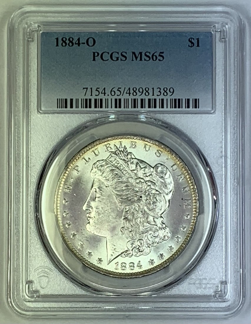 PCGS MS 65 1884-O Morgan Silver Dollar Uncirculated Certified Coin: PCGS MS 65 1884-O Morgan Silver Dollar Uncirculated Certified Coin This is an 1884-O Morgan Silver Dollar coin certified by PCGS with an MS 65 grade. The coin is uncirculated and composed of silver, o