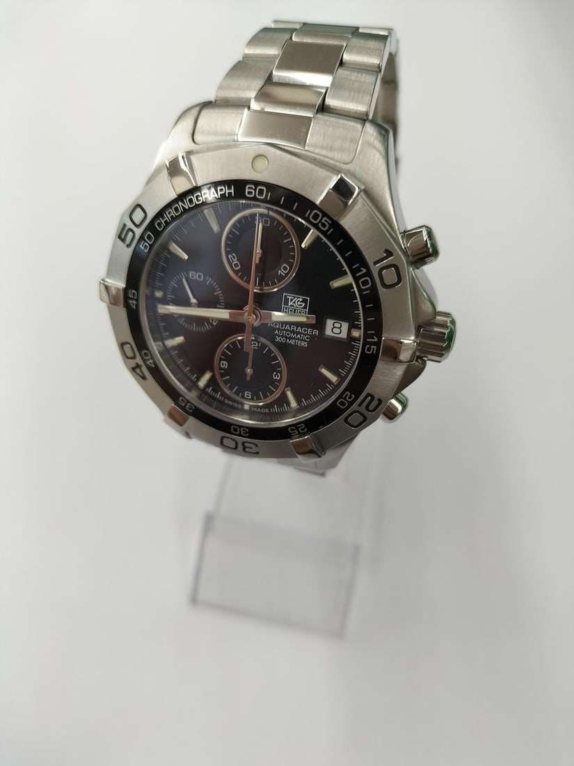 Mens Swiss Wristwatch TAG Heuer Aquaracer Chronograph CAF2110: Mens Swiss Wristwatch TAG Heuer Aquaracer Chronograph CAF2110 TAG Heuer Aquaracer Chronograph men's wristwatch in pre-owned condition. Swiss-made and designed for men, this watch is identified as a TA