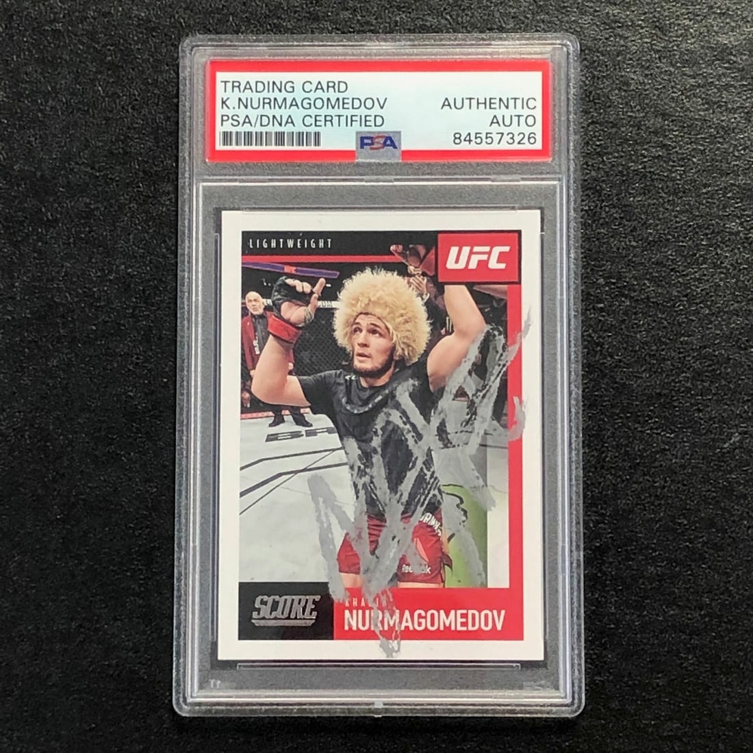 PSA Slabbed Khabib Nurmagomedov Autographed Panini Score 98 Card 2021: PSA Slabbed Khabib Nurmagomedov Autographed Panini Score 98 Card 2021 This is a 2021 Panini Score #98 sports trading card featuring Khabib Nurmagomedov. The card has been autographed by Khabib Nurmago