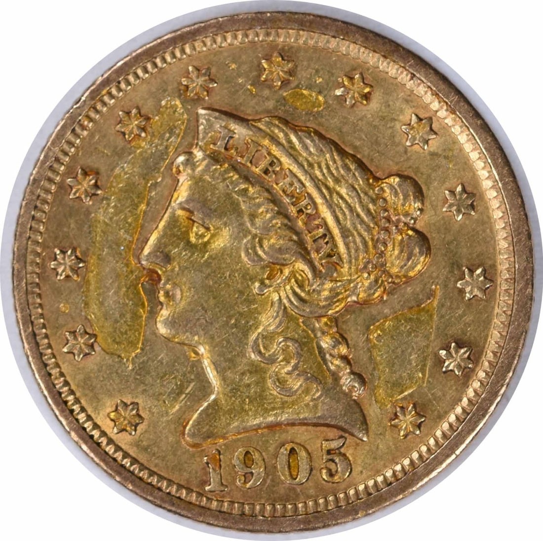1905 $2.50 Gold Liberty Head Coin AU Uncertified Philadelphia Mint: 1905 $2.50 Gold Liberty Head Coin AU Uncertified Philadelphia Mint This 1905 $2.50 Gold Liberty Head coin showcases the exquisite craftsmanship of its time, designed by Christian Gobrecht. With a grad