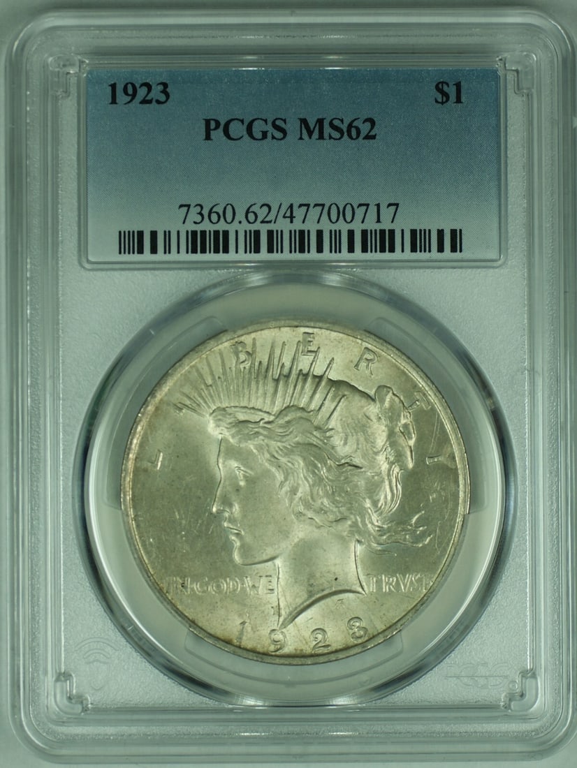 PCGS MS 62 Plus 1923 Peace Silver Dollar Uncirculated $1 Coin: PCGS MS 62 Plus 1923 Peace Silver Dollar Uncirculated $1 Coin This is a 1923 Peace Silver $1 Dollar Coin from the United States, certified by PCGS with a grade of MS 62+. The coin is composed of silve