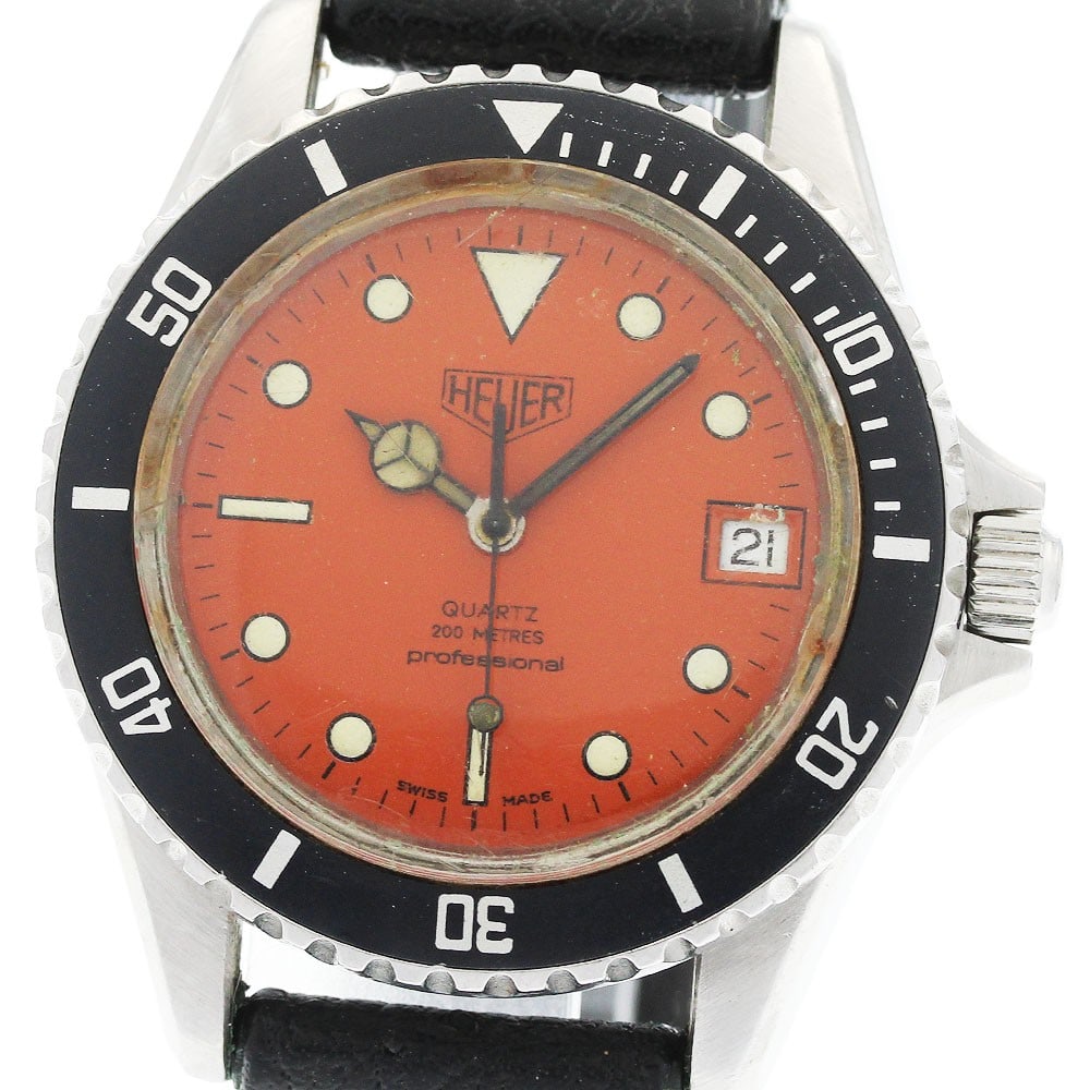 Heuer mens quartz wristwatch Professional Diver 200 date ref 980.014: Heuer mens quartz wristwatch Professional Diver 200 date ref 980.014 Heuer 980.014 Professional Diver 200 Date Quartz men's wristwatch. This pre-owned Swiss-made watch is identified as a professional 