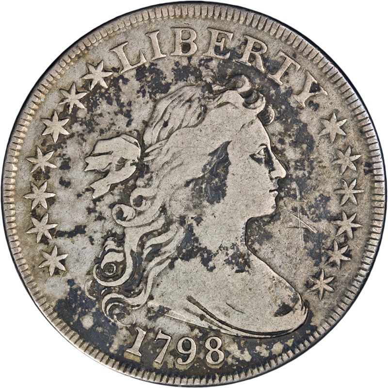 1798 Silver Bust Dollar F Details Circulated Coin: 1798 Silver Bust Dollar F Details Circulated Coin This 1798 Bust Dollar showcases decent eye appeal with a nice strike, characteristic of its historical significance. The coin is circulated and graded