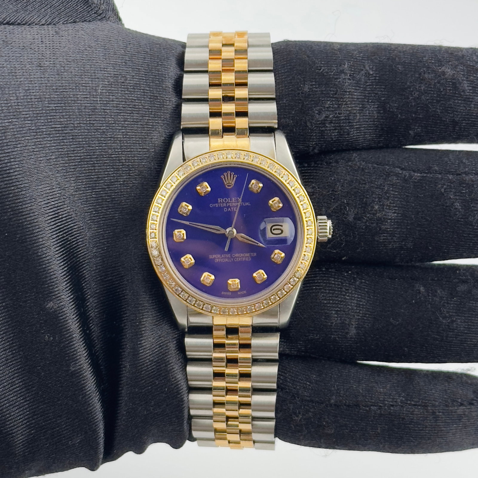 Rolex Oyster Perpetual Date 6694 Watch Royal Blue Dial With Aftermarket Jubilee Bracelet: Rolex Oyster Perpetual Date 6694 Watch Royal Blue Dial With Aftermarket Jubilee Bracelet This Rolex Oyster Perpetual Date features a striking royal blue dial and is equipped with an aftermarket Jubile