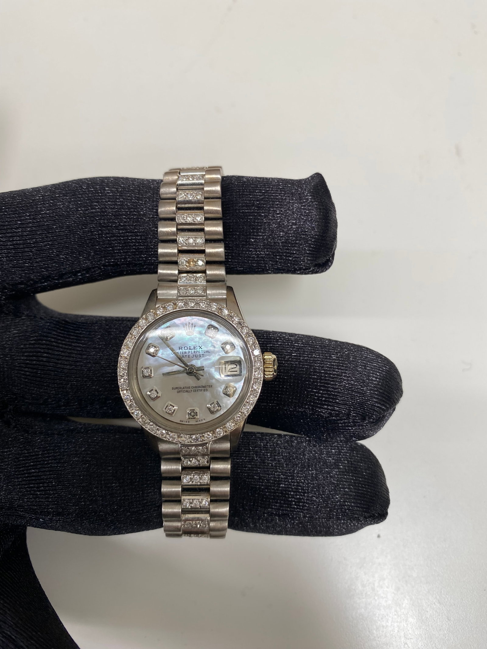 Ladies Rolex 6517 Datejust President Watch White MOP Dial Diamond Bezel: Ladies Rolex 6517 Datejust President Watch White MOP Dial Diamond Bezel This ladies' Rolex Datejust features a white mother-of-pearl dial, a diamond-set bezel, and a President bracelet adorned with di