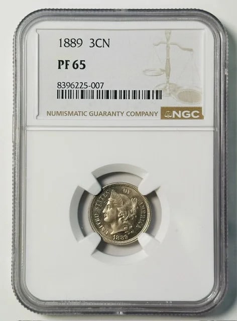 1889 USA Proof 3 Cent Nickel Coin NGC PF65: 1889 USA Proof 3 Cent Nickel Coin NGC PF65 1889 Three Cent Piece in nickel composition, certified by NGC with a PF 65 grade and proof strike. The coin is from the USA and is listed as pre-owned. Speci
