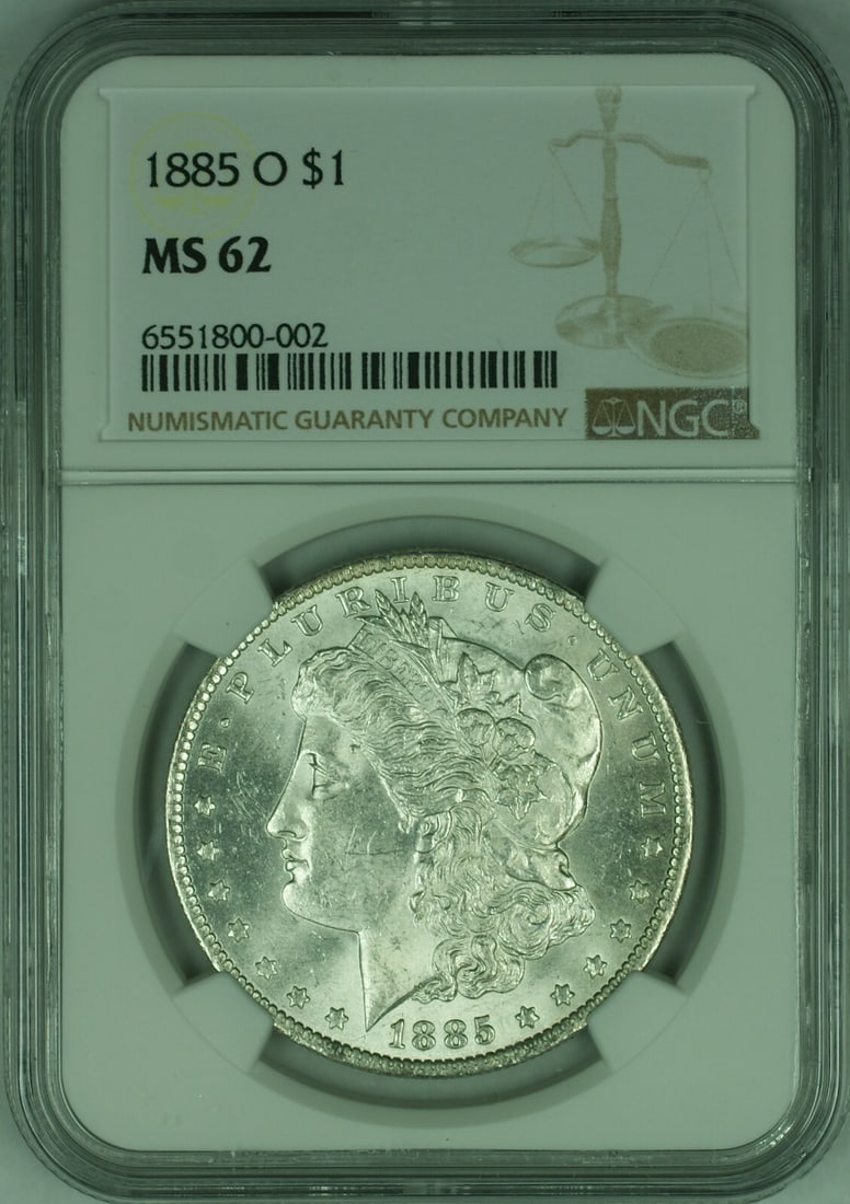NGC MS-62 1885-O Morgan Silver Dollar Coin from New Orleans Mint: NGC MS-62 1885-O Morgan Silver Dollar Coin from New Orleans Mint This is an 1885-O $1 Morgan Silver Dollar coin graded MS-62 by NGC. The coin was minted in New Orleans and is composed of silver. It is