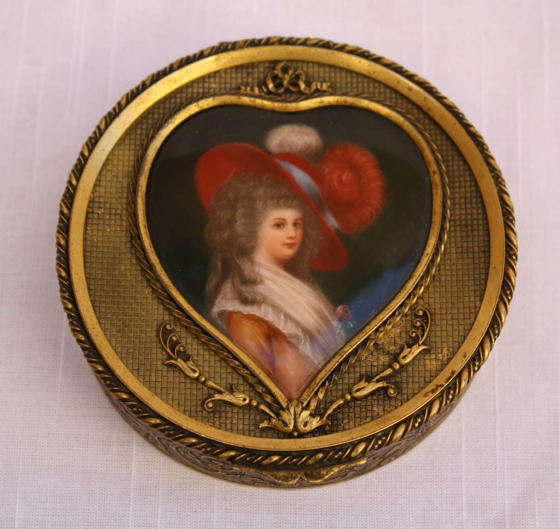 19th Century French Dore Bronze Hand Painted Porcelain Box: 19th Century French Dore Bronze Hand Painted Porcelain Box This exquisite late 19th century French box features a stunning dore bronze construction paired with intricately hand-painted porcelain. The 