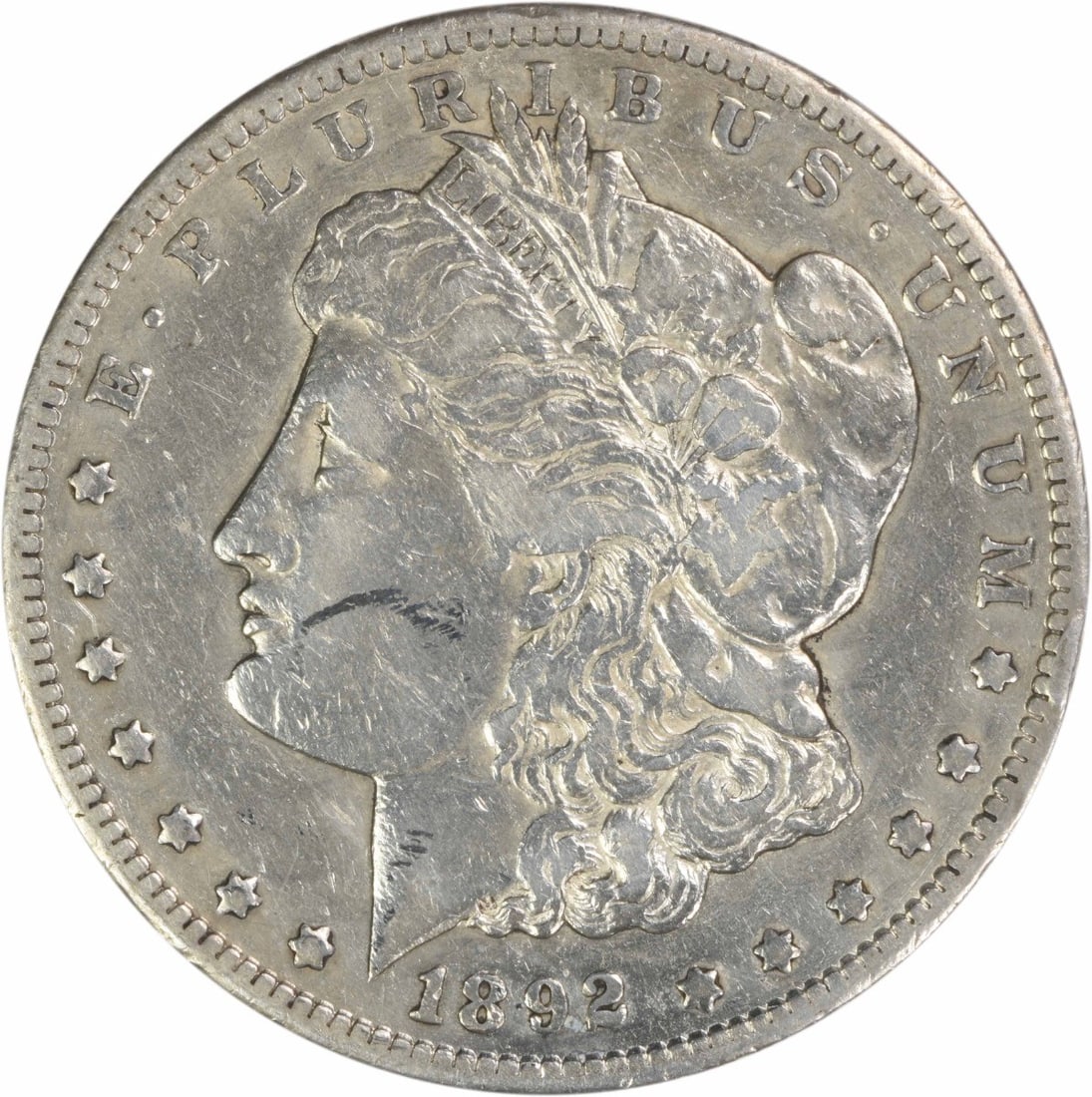Carson City 1892 Morgan Dollar 90 Percent Silver EF Grade Uncertified: Carson City 1892 Morgan Dollar 90 Percent Silver EF Grade Uncertified This 1892-CC Morgan Silver Dollar is a circulated coin from the Carson City Mint. Composed of 90% silver and 10% copper, it featur