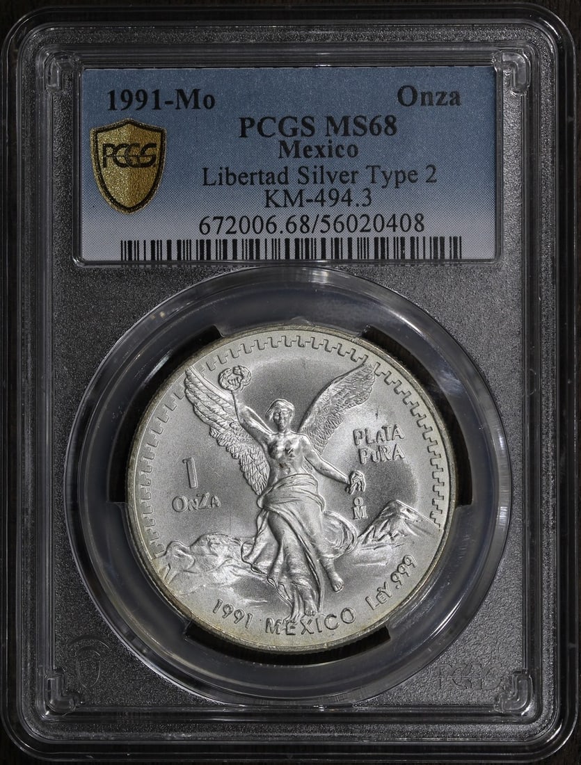 1991 Mexico Libertad Silver Onza MS68 PCGS Rare Type 2 Coin: 1991 Mexico Libertad Silver Onza MS68 PCGS Rare Type 2 Coin This exceptional 1991 Mexican Libertad coin is a rare Type 2 edition, renowned for its high-grade quality. Composed of .999 fine silver, it 