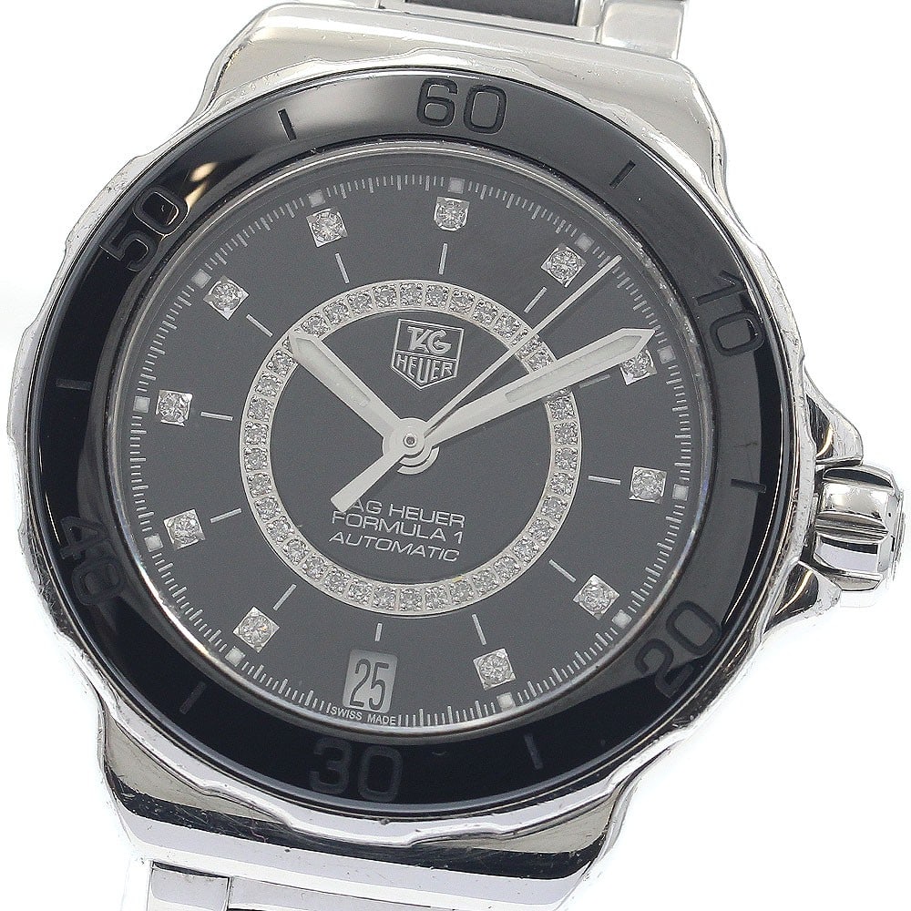 TAG Heuer Formula 1 Diamond Date Women's Wristwatch WAU2210: TAG Heuer Formula 1 Diamond Date Women's Wristwatch WAU2210 This TAG HEUER Formula 1 Date Diamond women's wristwatch features a sophisticated design, crafted in Switzerland. It is a pre-owned timepiec