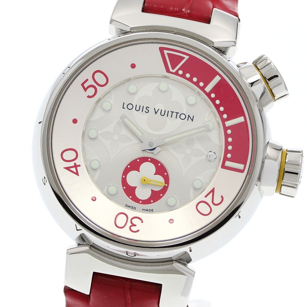 Louis Vuitton Tambour Q131V womens quartz diving wristwatch: Louis Vuitton Tambour Q131V womens quartz diving wristwatch A pre-owned Louis Vuitton women's wristwatch from the Tambour Diving line, featuring a small seconds display and quartz movement. The watch 