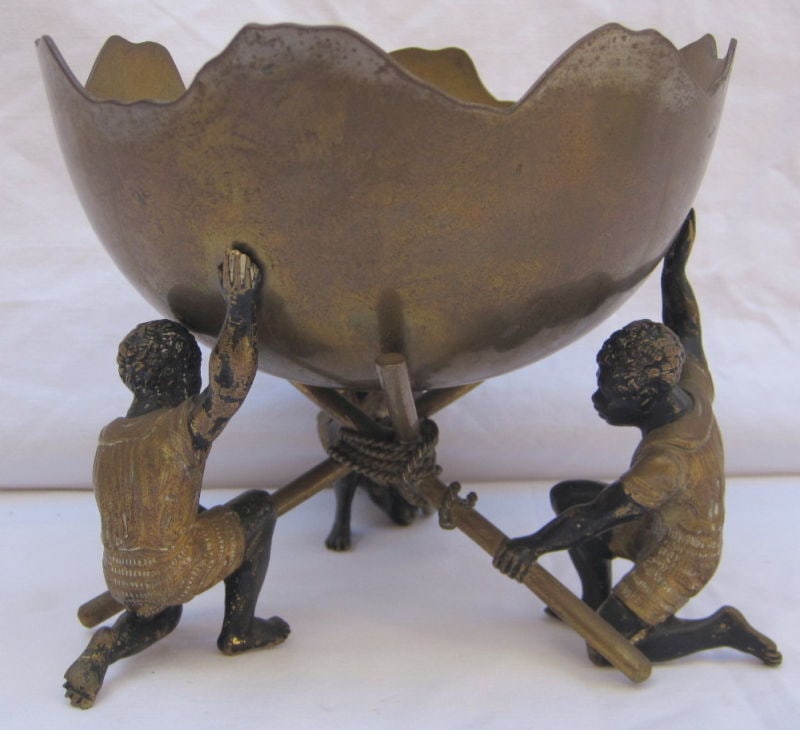 19th Century Austrian Bronze Center Bowl with Three Boys: 19th Century Austrian Bronze Center Bowl with Three Boys This exquisite 19th century Austrian Orientalist bronze center bowl showcases remarkable craftsmanship, featuring a detailed design of three bo