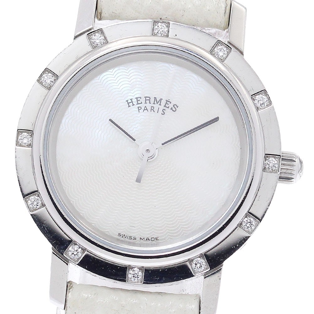 Hermes Clipper Nacre Quartz Women's Stainless Steel Watch CL4.230: Hermes Clipper Nacre Quartz Women's Stainless Steel Watch CL4.230 This Hermes Clipper Nacre women's wristwatch features a stainless steel case paired with a leather strap. The white shell dial is comp