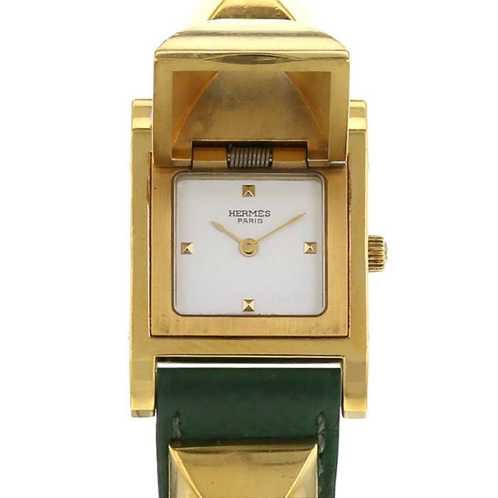 Ladies Medor Watch with White Dial and Leather Band by Hermes: Ladies Medor Watch with White Dial and Leather Band by Hermes This Hermes Medor watch features a white dial and a leather bracelet. It is designed for ladies and is part of the Medor series by Hermes.