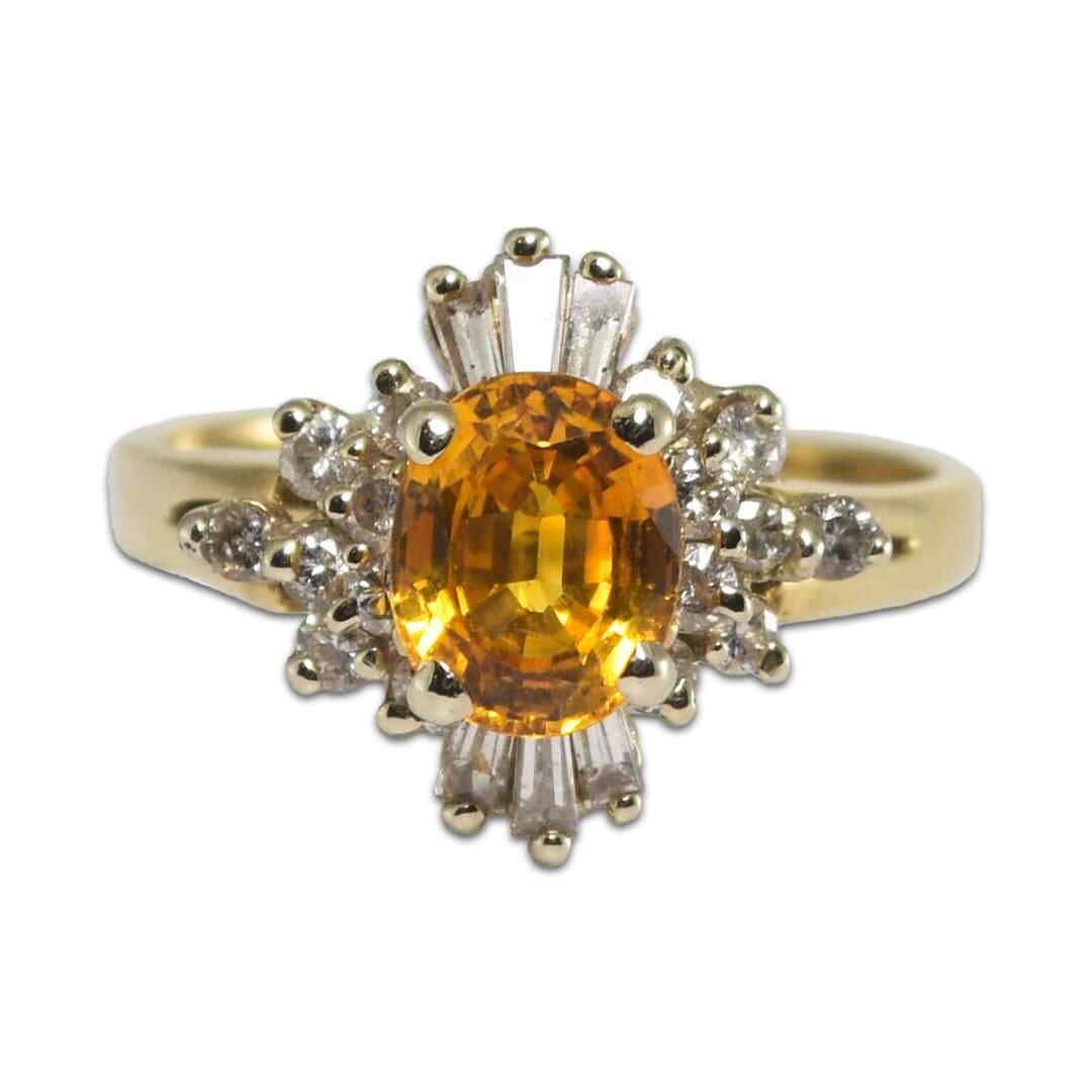 Oval Golden Yellow Sapphire Diamond Accent Ring 14K Two Tone Gold Size 7.25: Oval Golden Yellow Sapphire Diamond Accent Ring 14K Two Tone Gold Size 7.25 This elegant ring is crafted from 14K yellow and white gold and features a stunning oval-shaped golden yellow sapphire as it