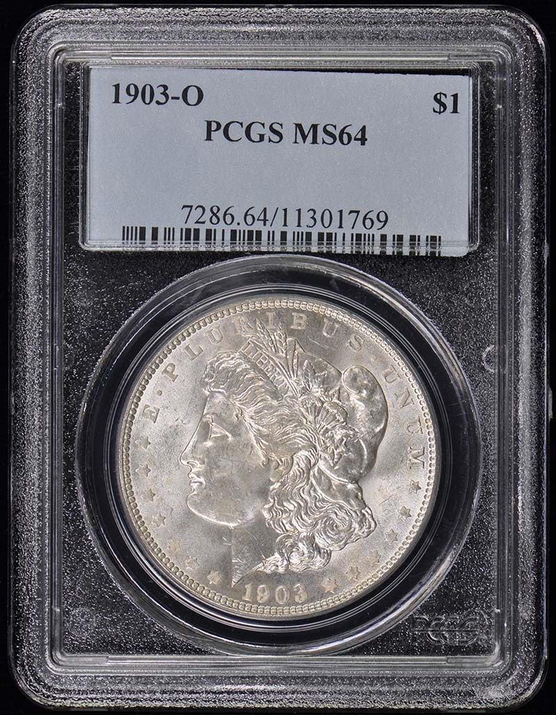 PCGS MS64 1903-O Morgan Silver Dollar Uncirculated New Orleans Mint: PCGS MS64 1903-O Morgan Silver Dollar Uncirculated New Orleans Mint This is a 1903-O Morgan Dollar, certified by PCGS with a grade of MS64. Struck at the New Orleans Mint, this uncirculated coin is a 