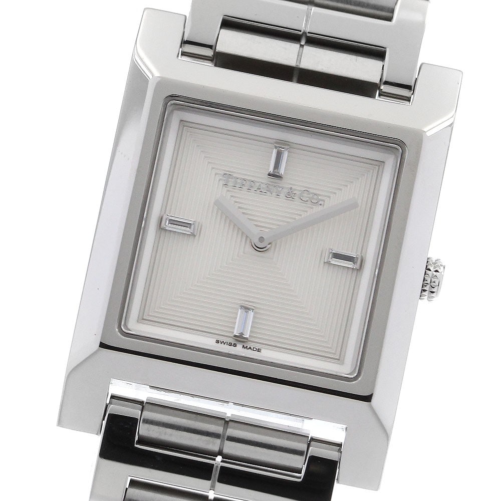 Tiffany Co 1837 Makers 22mm Square Quartz Wristwatch for Women: Tiffany Co 1837 Makers 22mm Square Quartz Wristwatch for Women Pre-owned Tiffany & Co. women's wristwatch from the 1837 Makers line. This square quartz watch measures 22 mm and is of Swiss origin. Spe