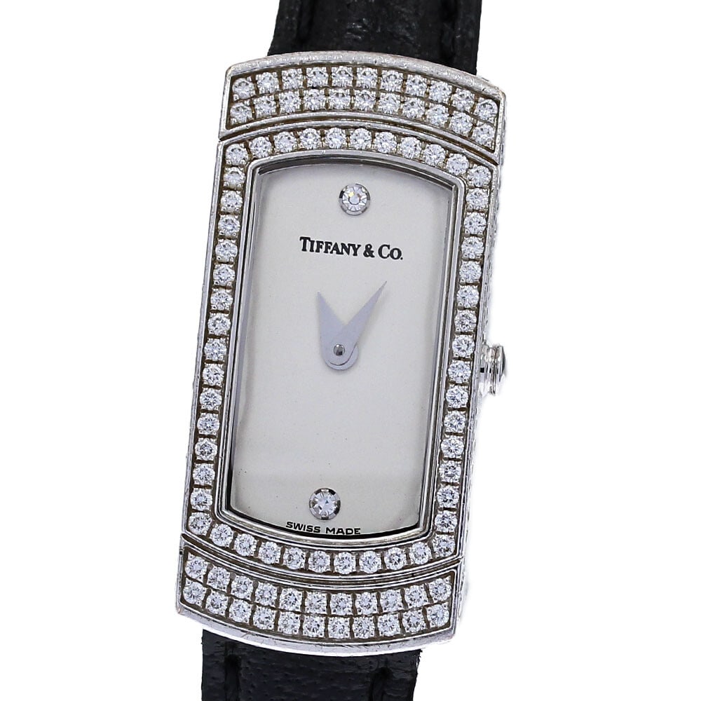 TIFFANY&Co. K18WG Diamond Quartz Ladies Cocktail Watch: TIFFANY&Co. K18WG Diamond Quartz Ladies Cocktail Watch This elegant TIFFANY&Co. Cocktail Watch is a stunning ladies' wristwatch crafted from K18 white gold and adorned with diamonds. The timepiece fea